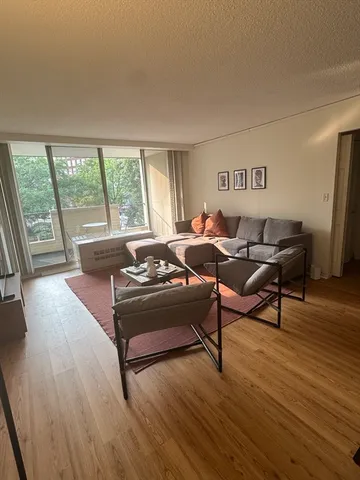 a living room with furniture and a table