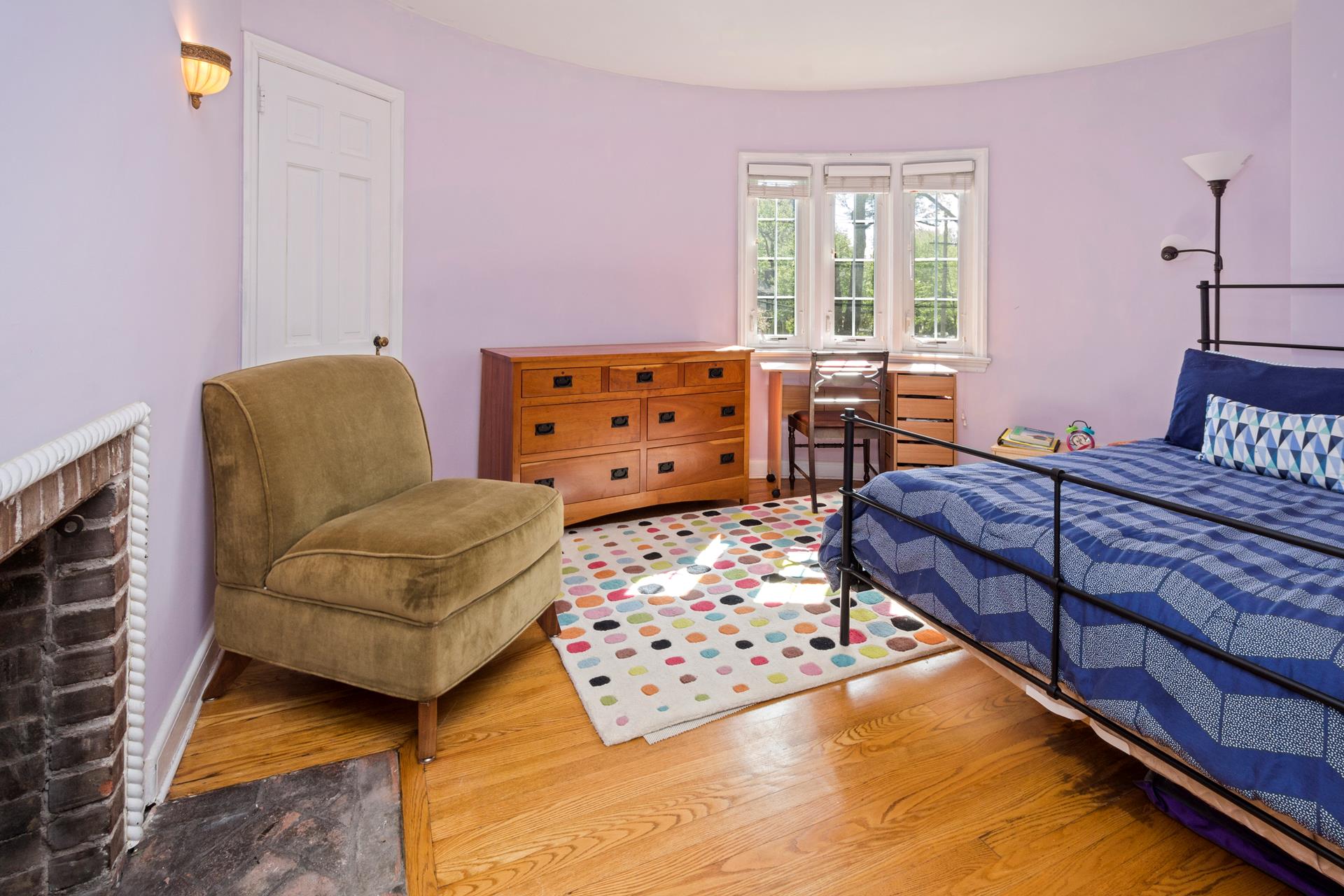 4600 Grosvenor Avenue Bronx, NY 10471 - Photo 7 of 13 a bedroom with a bed and wooden floor