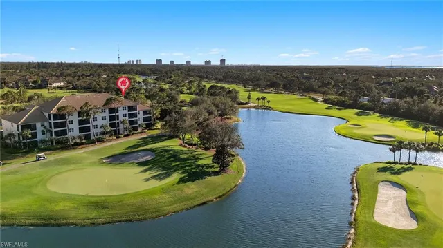 a view of a swimming pool with a lake