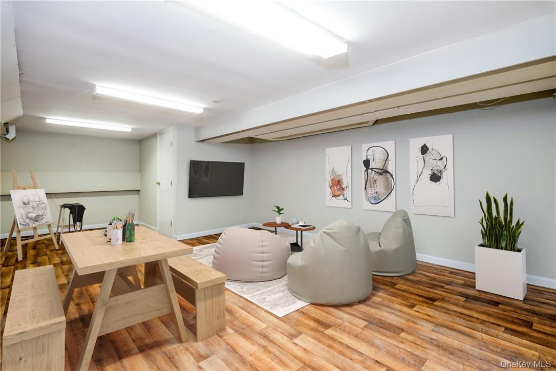 4 Parkfield Road Scarsdale, NY 10583 - Photo 24 of 33 Finished lower level recreation room with full bath (digitally staged).