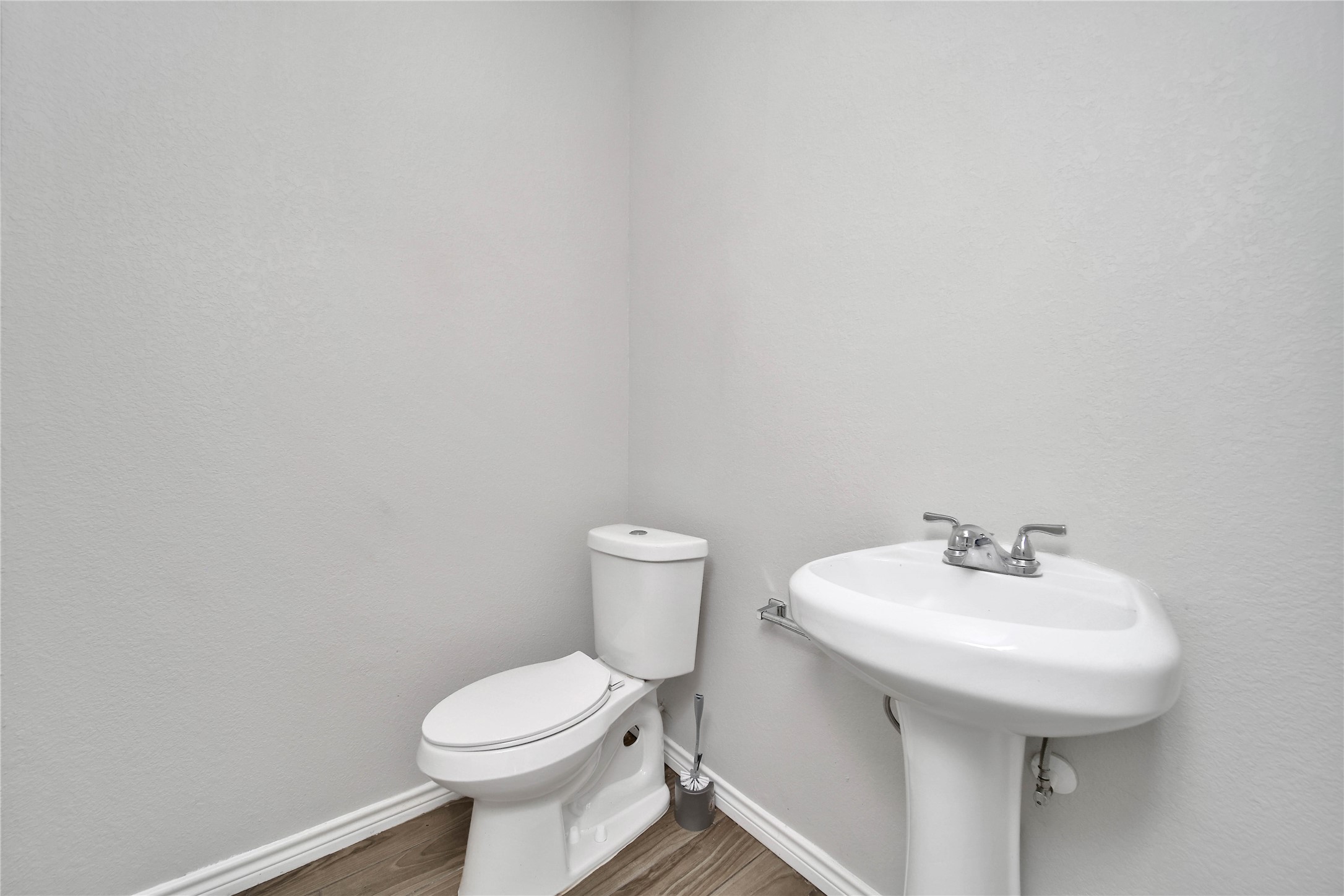 8034 Crestview Drive Houston, TX 77028 - Photo 8 of 15 a bathroom with a sink a toilet and a mirror