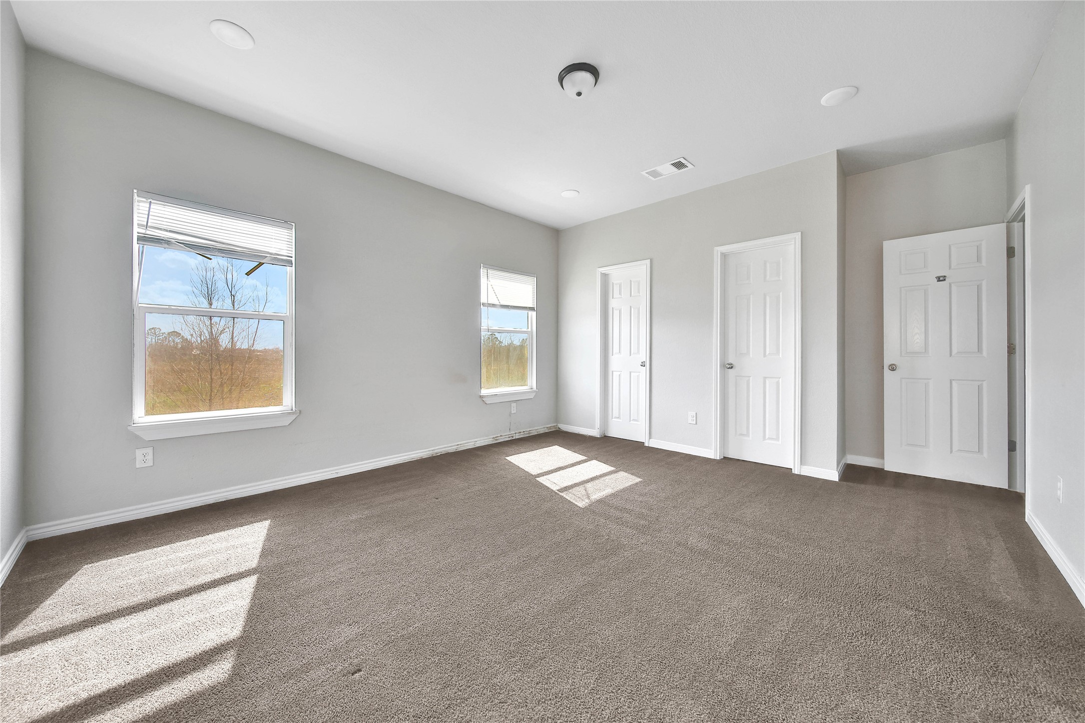 8034 Crestview Drive Houston, TX 77028 - Photo 9 of 15 a view of empty room with windows
