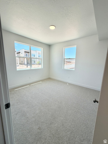 915 West Gold Ridge Ln Street St. George, UT 84790 - Photo 9 of 30 Light filled bedroom or flex room on entry level