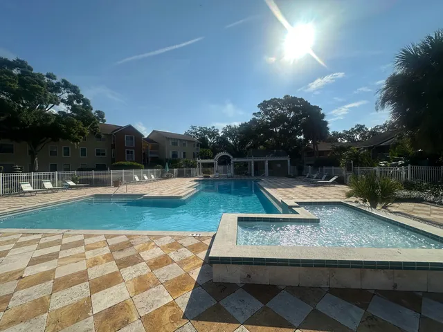 a view of swimming pool with a yard