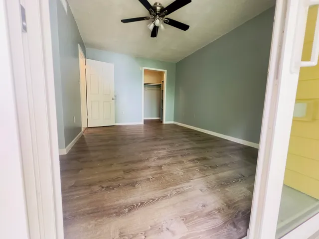 a view of an empty room and window