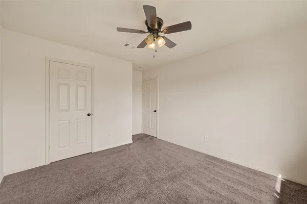 a view of bathroom with a sink and mirror