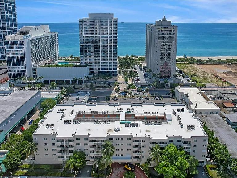 6801 Harding Avenue, Unit 306 Miami Beach, FL 33141 - Photo 2 of 30 a view of a city with tall buildings