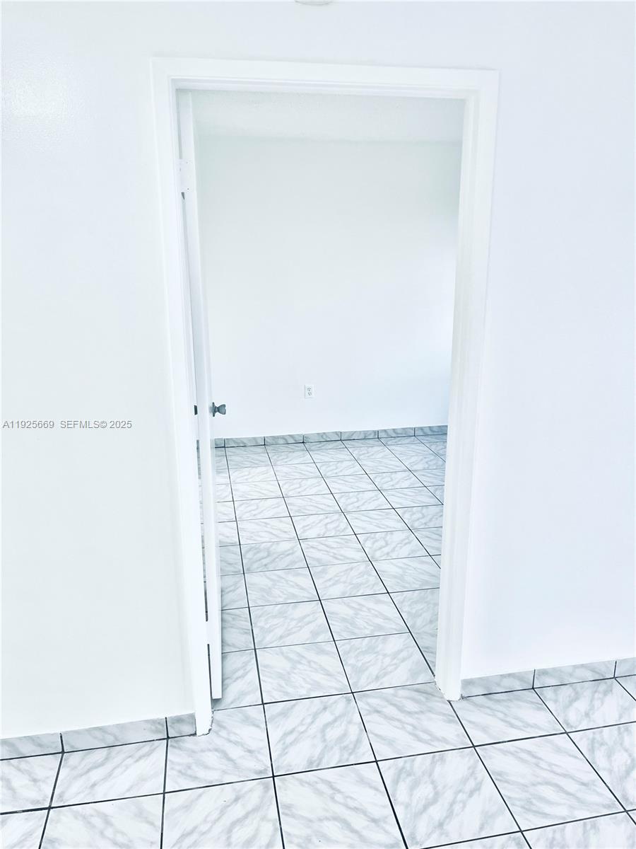 6801 Harding Avenue, Unit 306 Miami Beach, FL 33141 - Photo 21 of 30 a view of an empty room