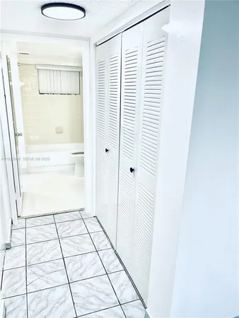 a view of a room with racks on the wall