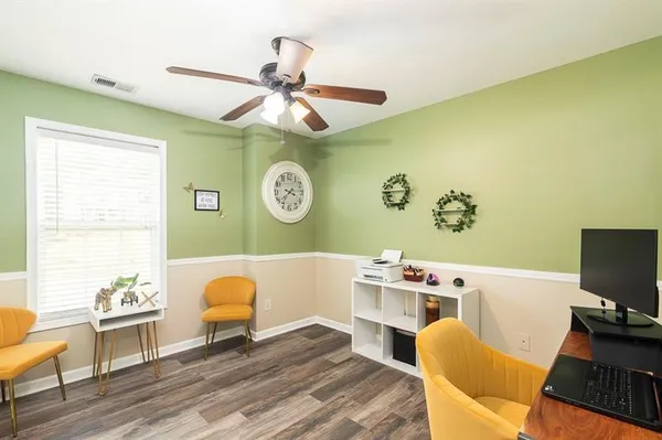 a kitchen with stainless steel appliances granite countertop a refrigerator stove top oven and sink