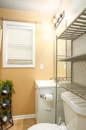 a front view of a house with a yard table and chairs