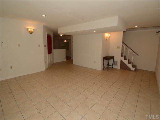 1328 Princess Anne Road Cary, NC 27513 - Photo 15 of 20 an empty room with projector and furniture