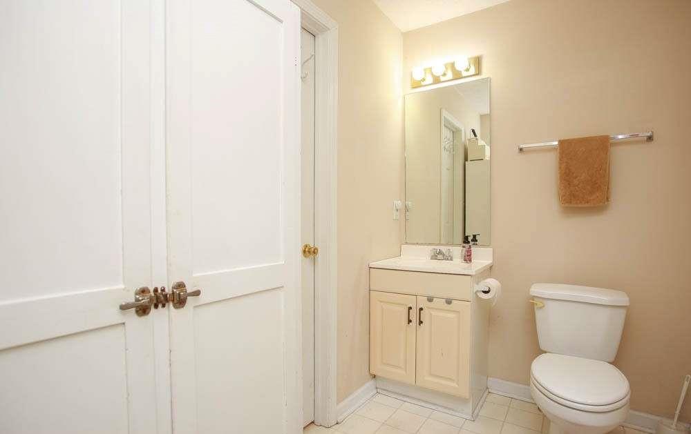 177 Rustin Drive Dallas, GA 30157 - Photo 13 of 26 a bathroom with a toilet a sink and mirror