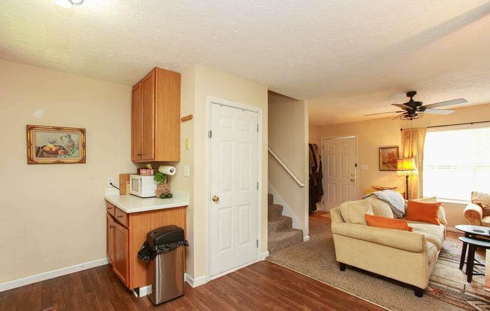 177 Rustin Drive Dallas, GA 30157 - Photo 10 of 26 a living room with furniture and a fireplace