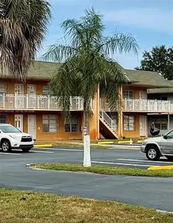 a front view of a house with a ocean view