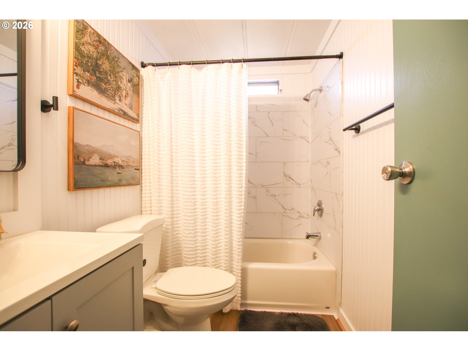 1431 Maple Street Florence, OR 97439 - Photo 25 of 43 a bathroom with a granite countertop sink toilet and shower