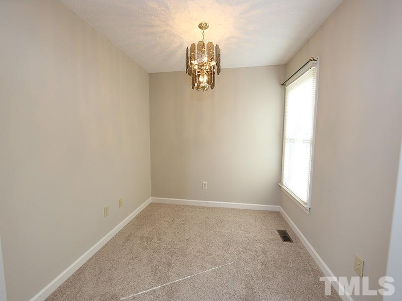 4791 Thomas Road Henderson, NC 27537 - Photo 13 of 25 an empty room that has a window