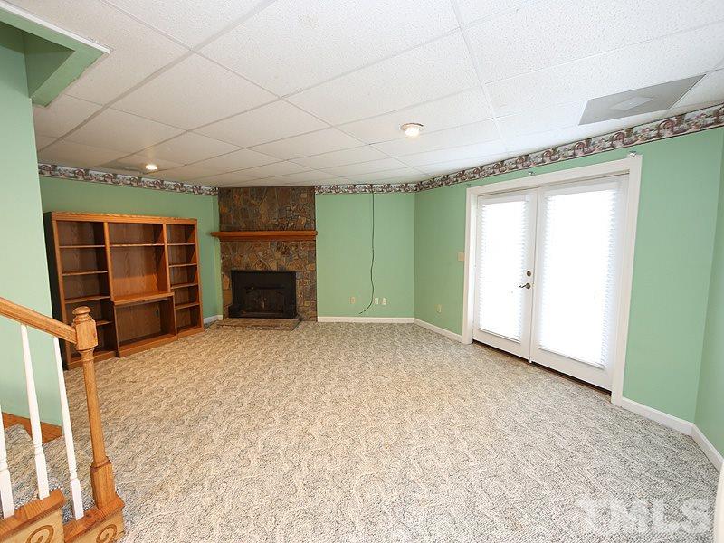 4791 Thomas Road Henderson, NC 27537 - Photo 20 of 25 a big room with closet and windows