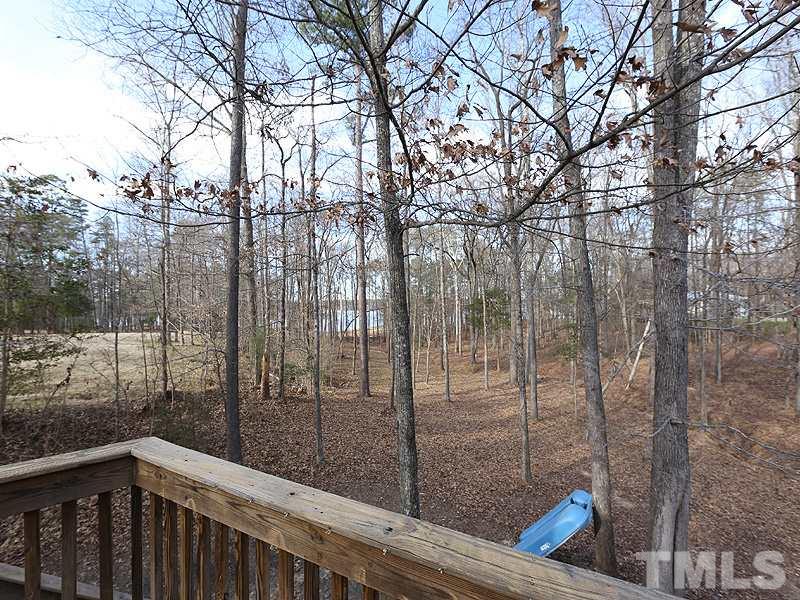 4791 Thomas Road Henderson, NC 27537 - Photo 25 of 25 a view of a balcony with a tree