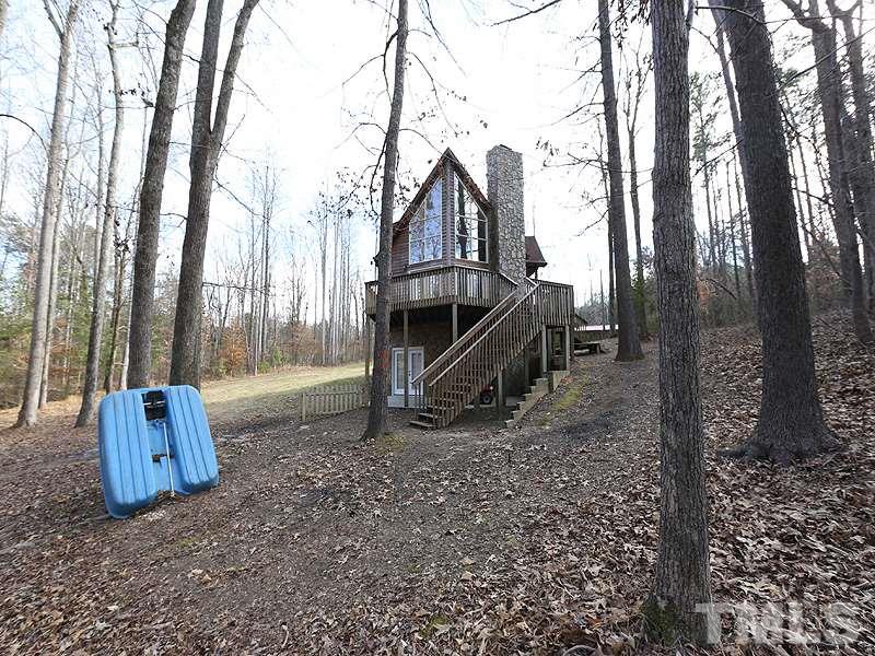 4791 Thomas Road Henderson, NC 27537 - Photo 5 of 25 a view of backyard with green space