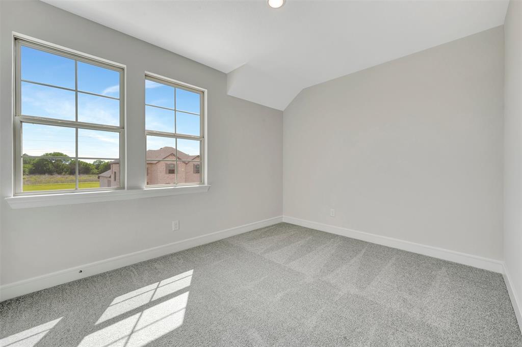11460 Wulstone Road Fort Worth, TX 76052 - Photo 22 of 40 an empty room with windows