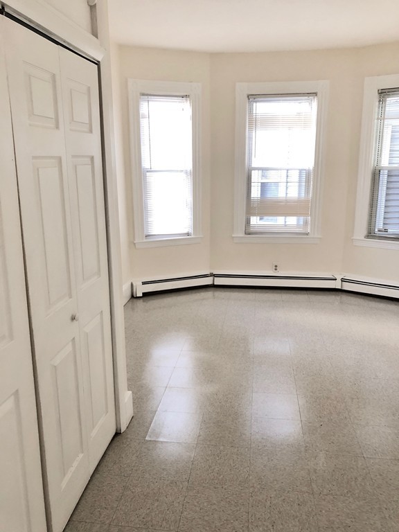 10 Buckley Avenue, Unit 1 Boston, MA 02130 - Photo 14 of 15 a view of an empty room with a window
