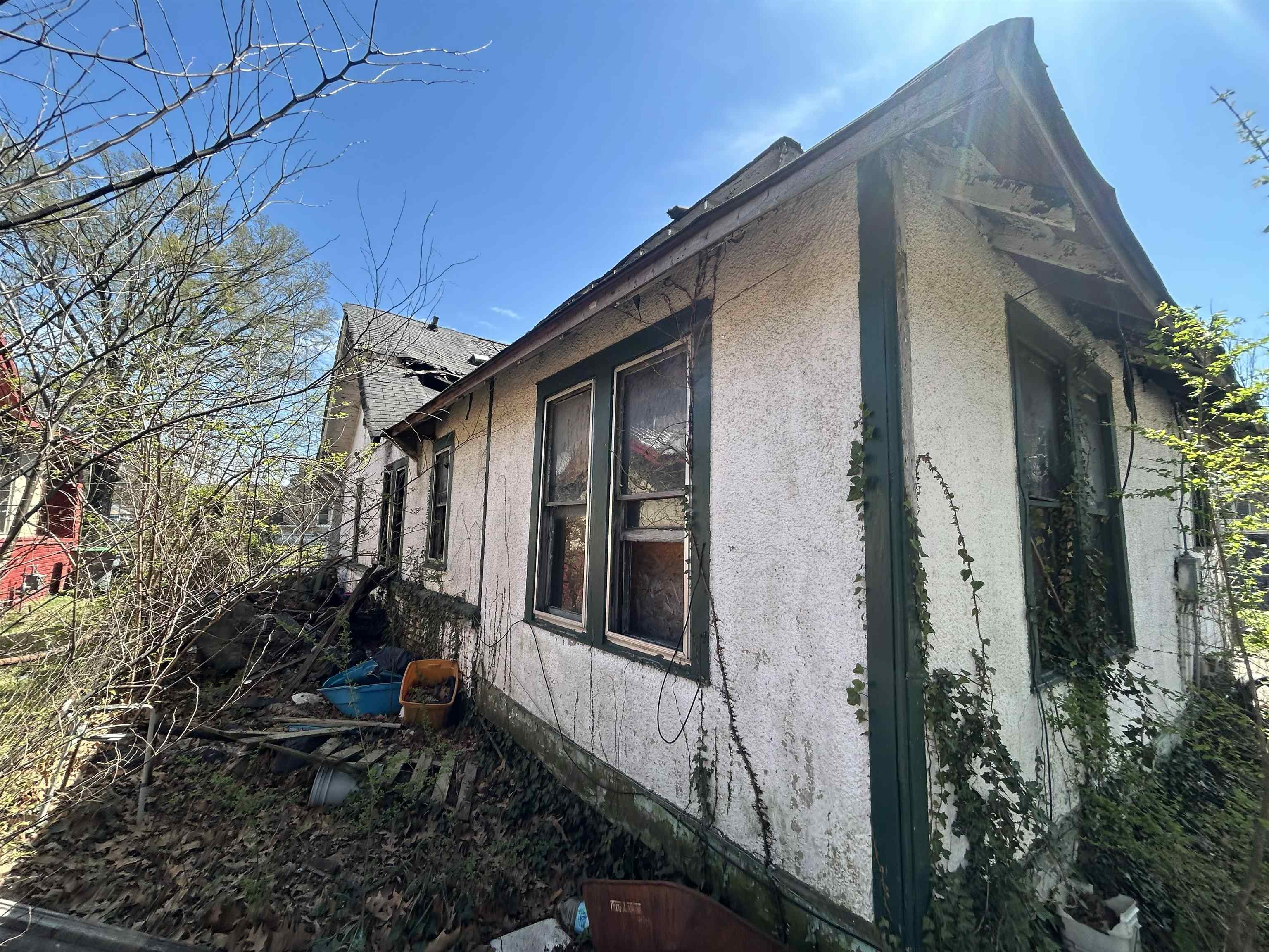 1135 Rayner Street Memphis, TN 38106 - Photo 6 of 6 View of home's exterior featuring stucco siding