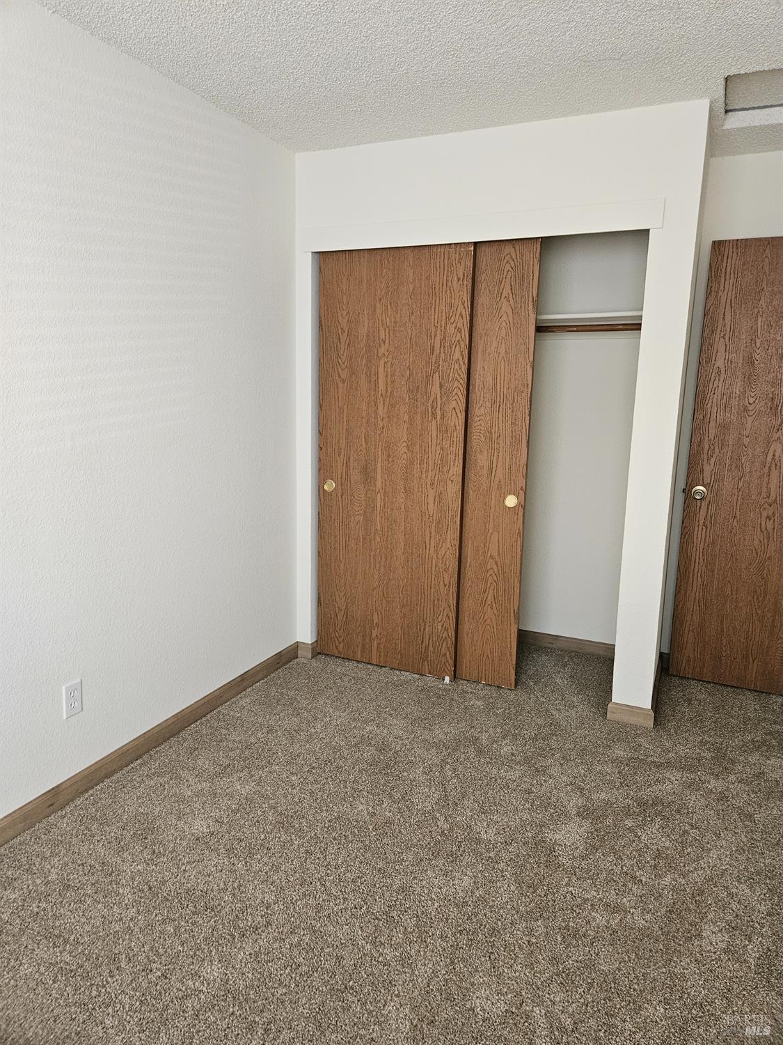 1930 Grande Circle, Unit 72 Fairfield, CA 94533 - Photo 30 of 34 an empty room with closet