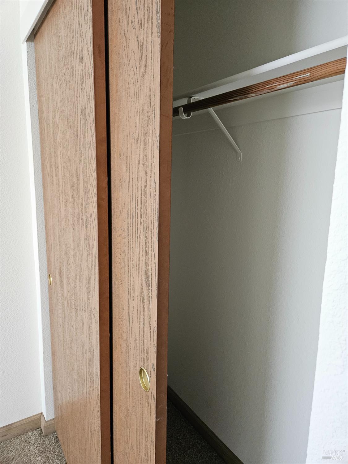 1930 Grande Circle, Unit 72 Fairfield, CA 94533 - Photo 33 of 34 a bathroom with a glass shower door