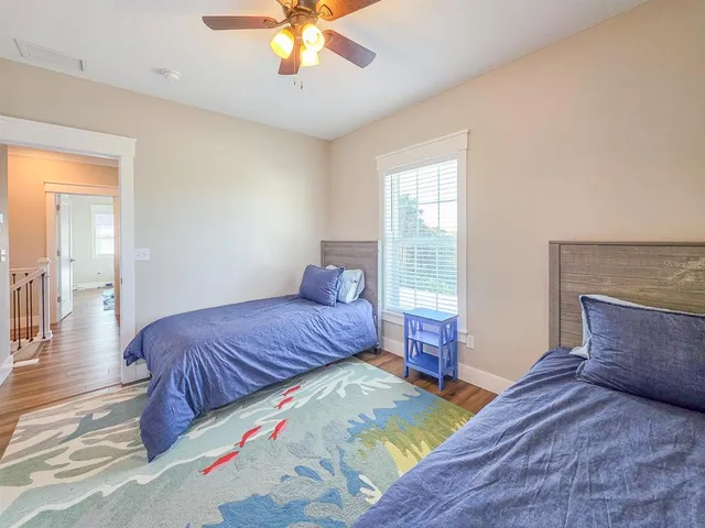 a view of balcony with wooden floor