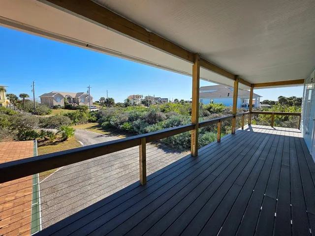 a view of a terrace with a garden