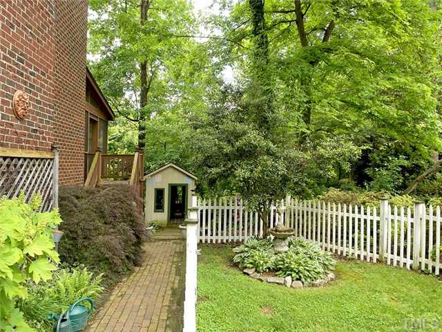 2520 Beechridge Road Raleigh, NC 27608 - Photo 21 of 25 Potting shed at the end of the brick walkway.