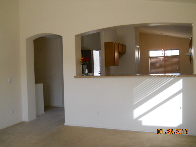 8519 West Payson Road Tolleson, AZ 85353 - Photo 6 of 19 Family room view of kitchen