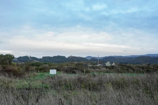 a view of mountains and valleys