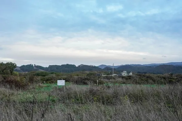 a view of mountains and valleys
