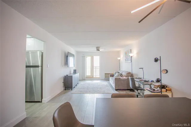 a balcony with view of an outdoor space