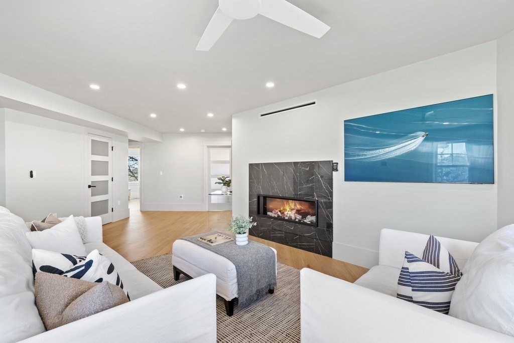 4 Cliff Estates Road Scituate, MA 02066 - Photo 3 of 42 a living room with furniture and a fireplace