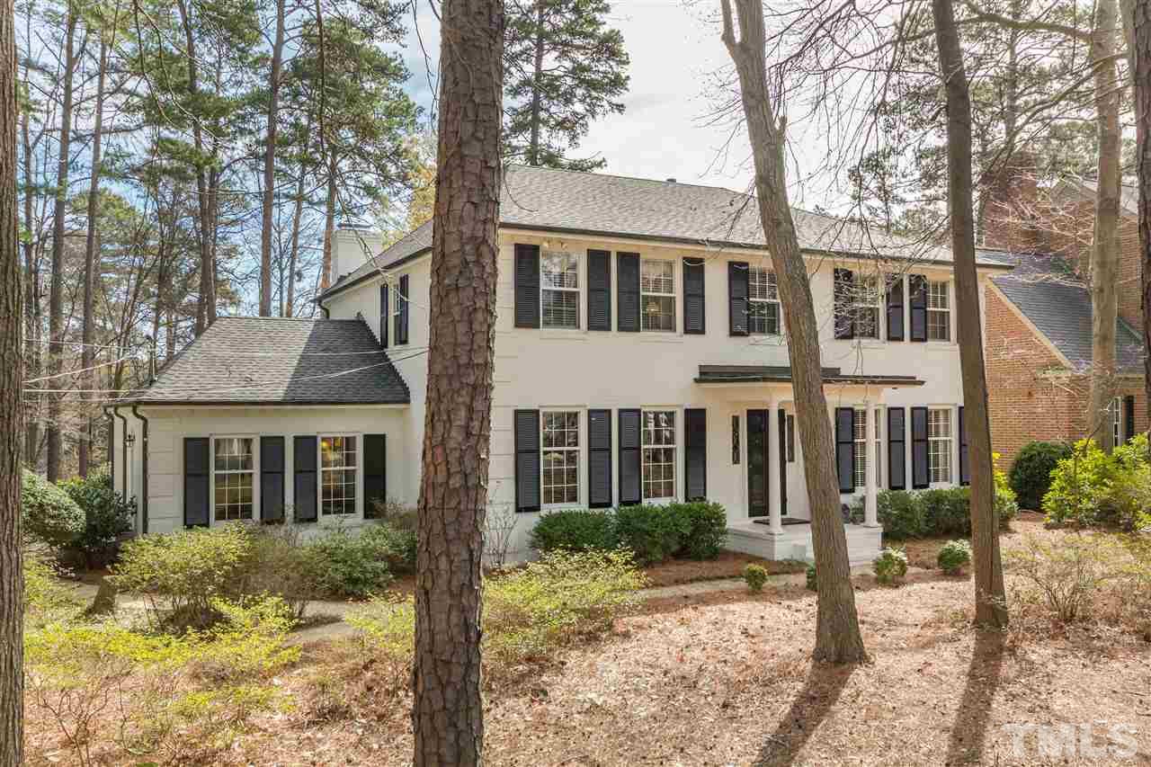 2408 Ridge Road Raleigh, NC 27612 - Photo 2 of 25 a front view of a house with a yard