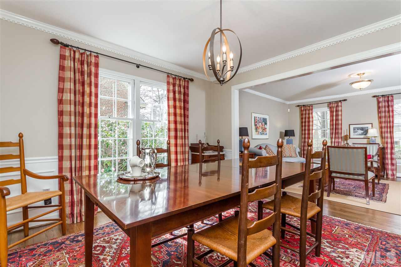 2408 Ridge Road Raleigh, NC 27612 - Photo 12 of 25 a very nice looking dining room with furniture window and wooden floor