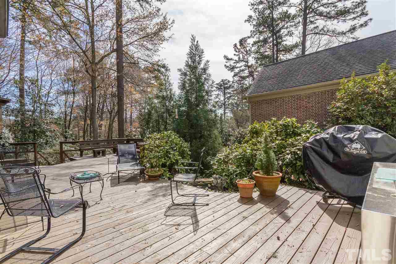 2408 Ridge Road Raleigh, NC 27612 - Photo 24 of 25 a view of a chairs and table on the wooden floor