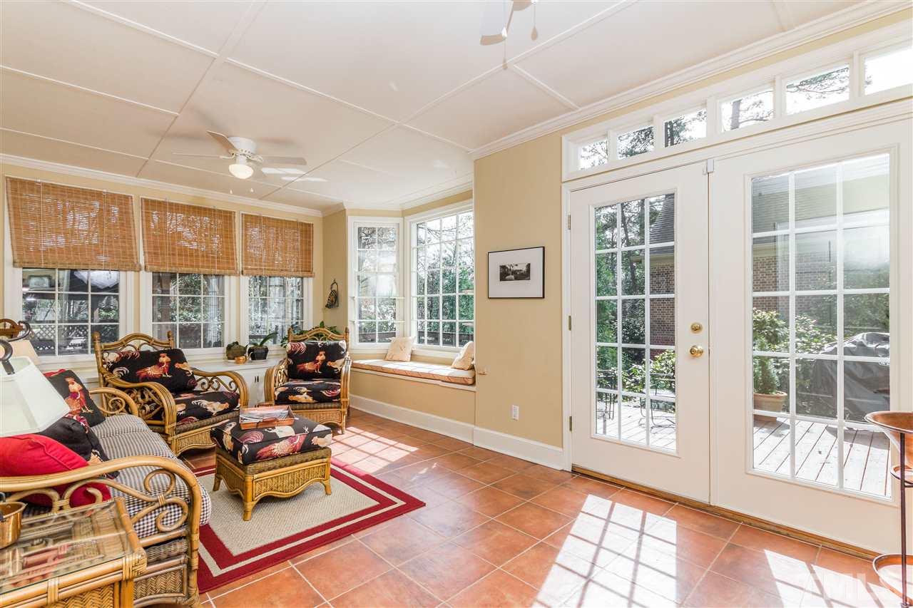 2408 Ridge Road Raleigh, NC 27612 - Photo 7 of 25 a living room with furniture windows and wooden floor
