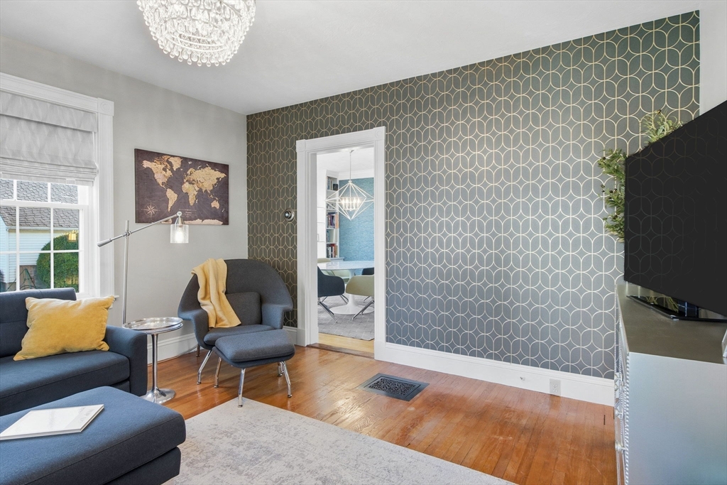 300 Greeley Street Clinton, MA 01510 - Photo 11 of 40 a living room with furniture and a flat screen tv