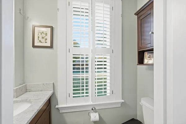 a view of a kitchen that has a sink and a window in it