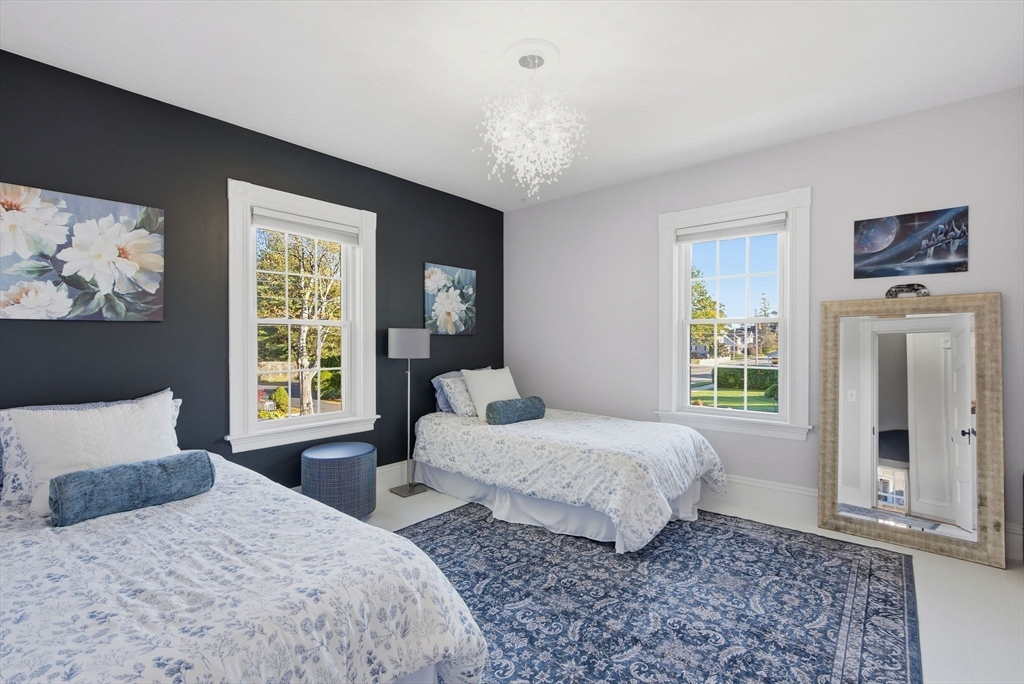 300 Greeley Street Clinton, MA 01510 - Photo 15 of 40 a bedroom with two beds and a window