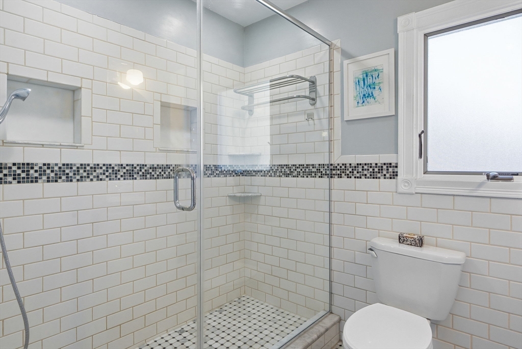 300 Greeley Street Clinton, MA 01510 - Photo 22 of 40 a bathroom with a toilet and a shower