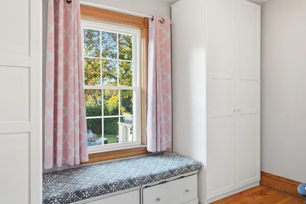 a view of a room that has a window in it
