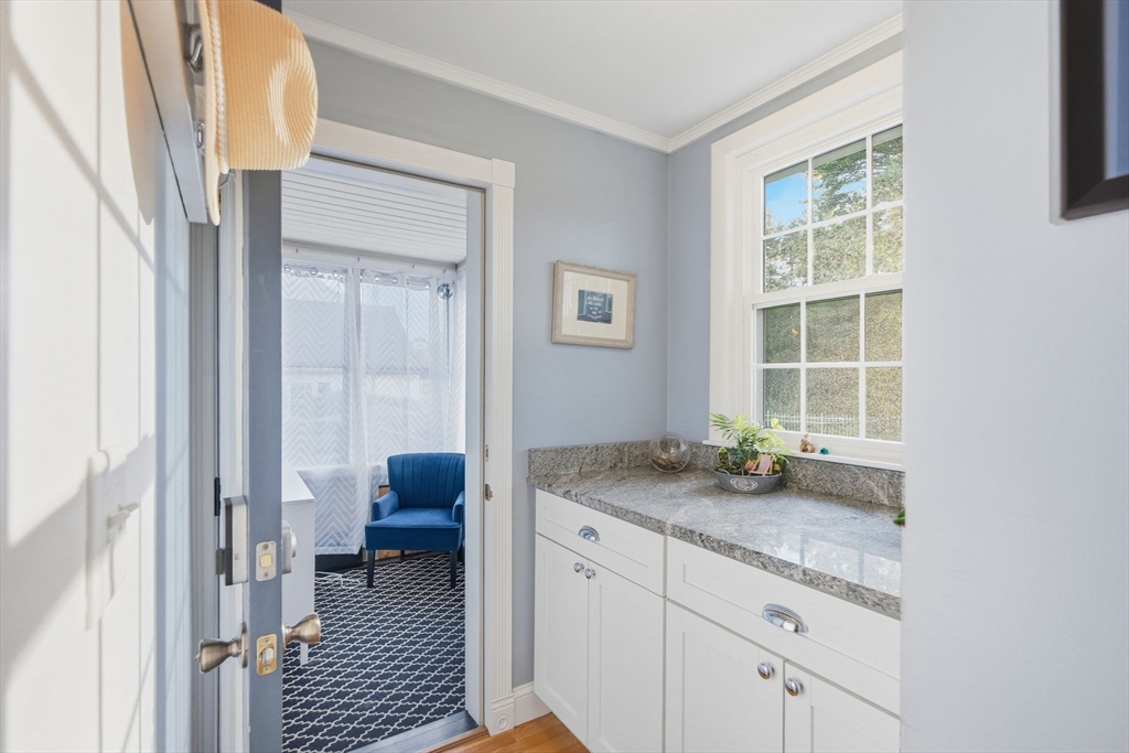 300 Greeley Street Clinton, MA 01510 - Photo 26 of 40 a en suite bathroom with a granite countertop sink and a window