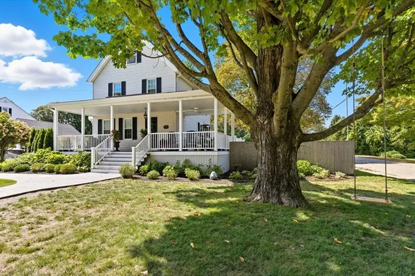 front view of a house with a yard