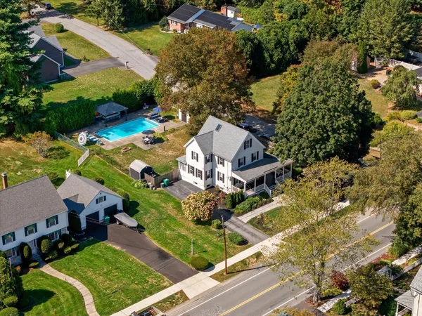 an aerial view of a house with a garden