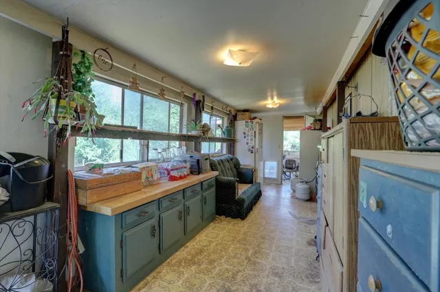 a view of a car park in front of house